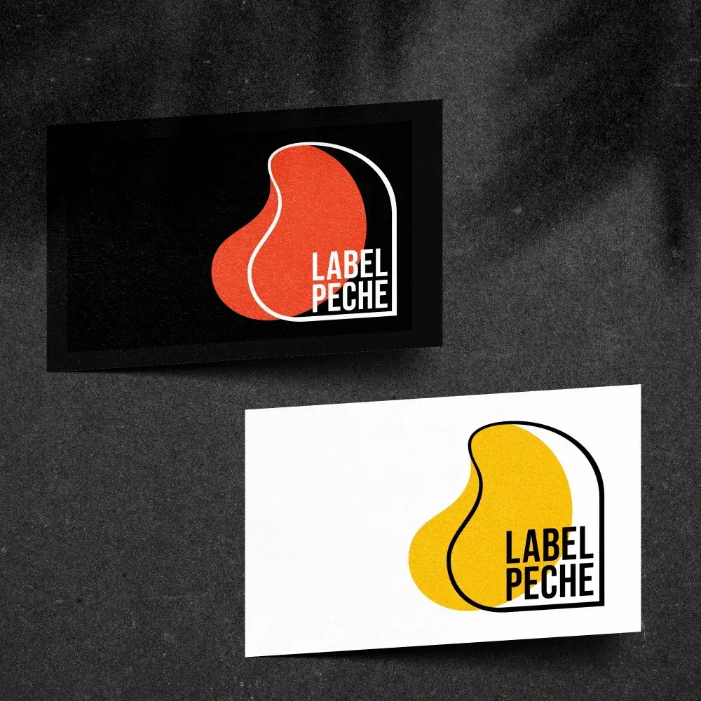 Label Pêche business card with red and yellow logos on black and white backgrounds.